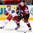 MINSK, BELARUS - MAY 19: Latvia's Georgijs Pujacs #81 and Andrei Kostitsyn #46 of Belarus battle for the puck during preliminary round action at the 2014 IIHF Ice Hockey World Championship. (Photo by Andre Ringuette/HHOF-IIHF Images)

